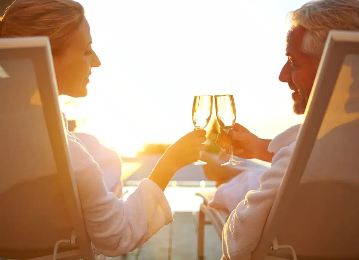 couple drinking champagne poolside at canyon ranch