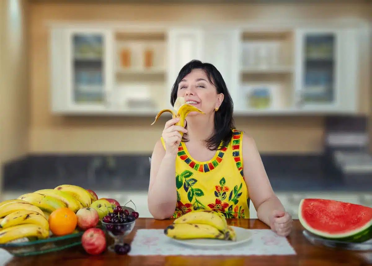 woman eating a banana