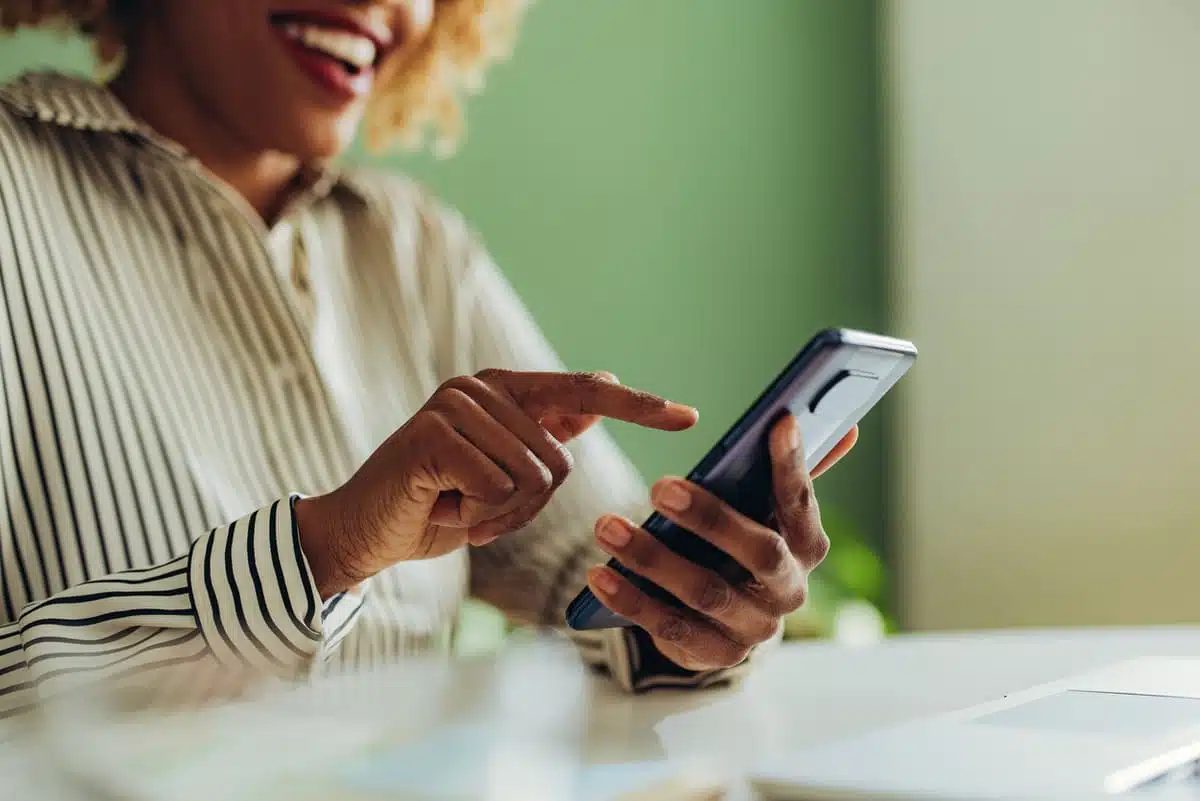 woman playing brain games on her phone