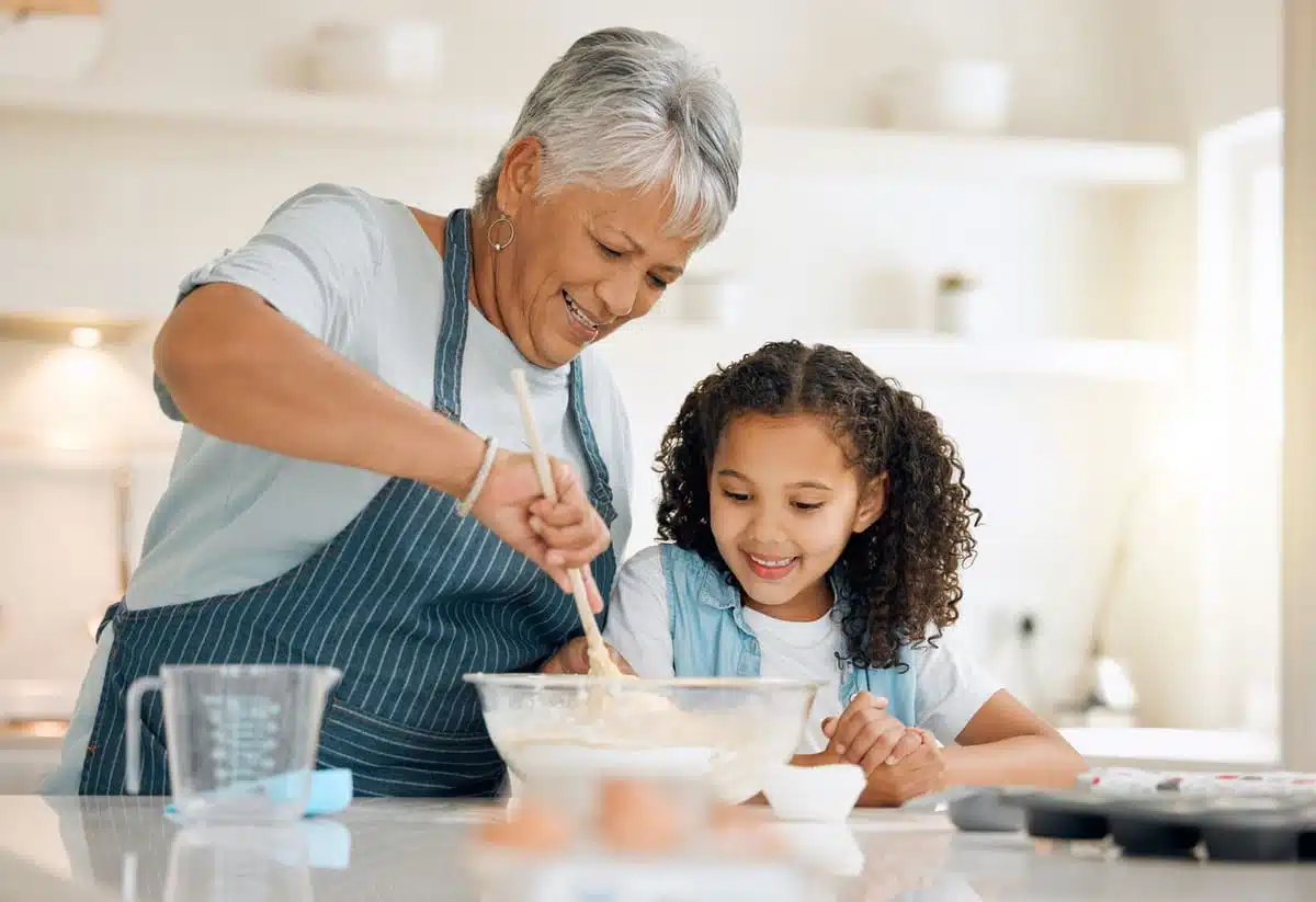Grandmother and granddaughter baking