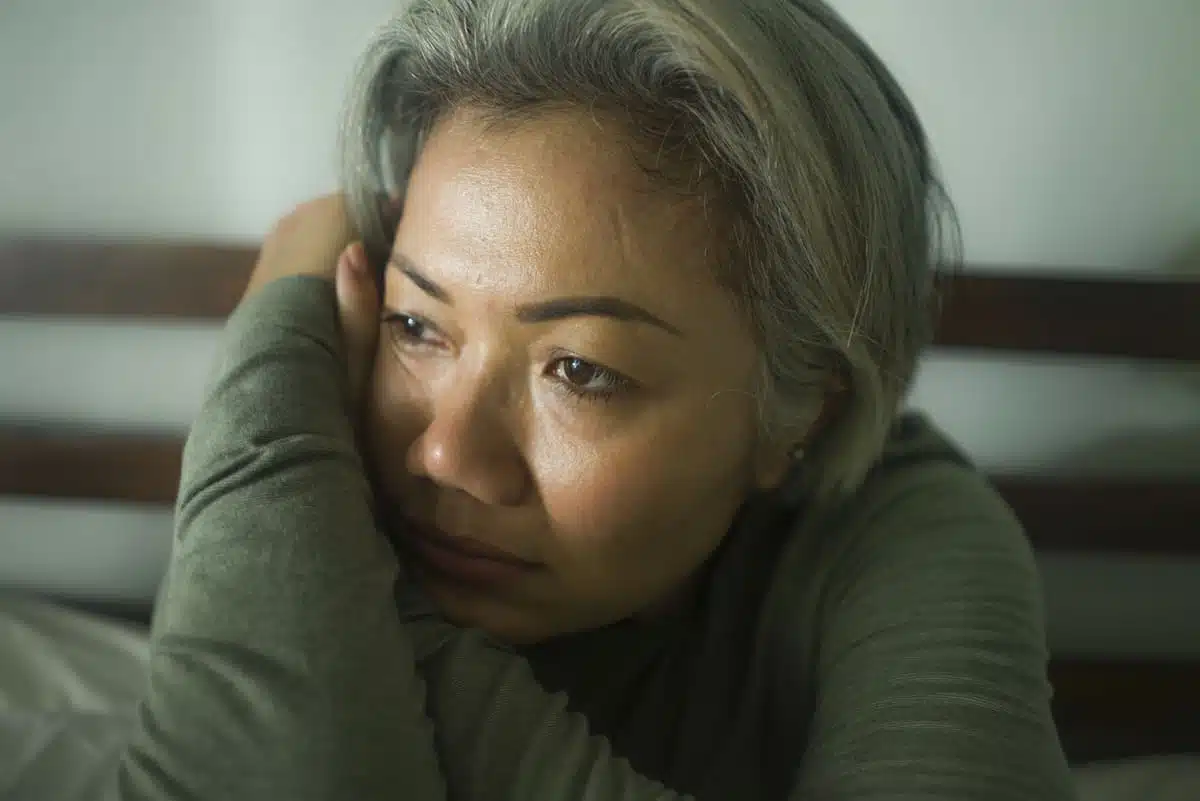 Sad woman feeling lost in her 50s