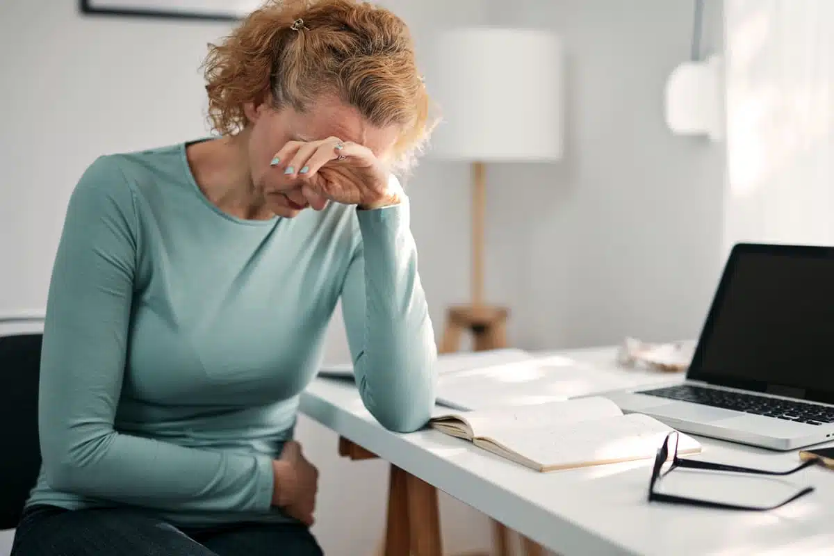 Woman feeling nauseous stomachache
