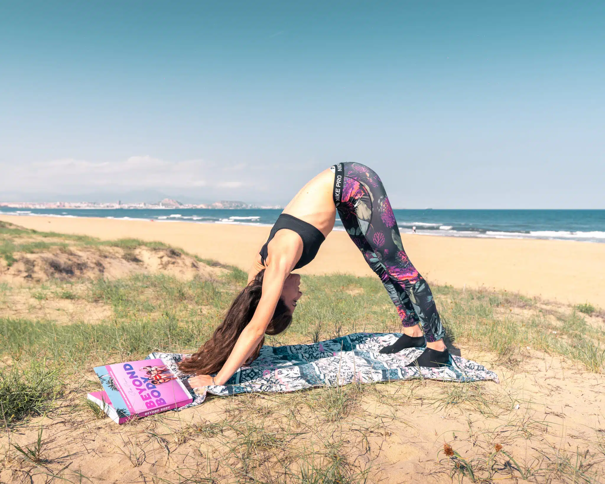 Yoga on the beach wiht beyond body