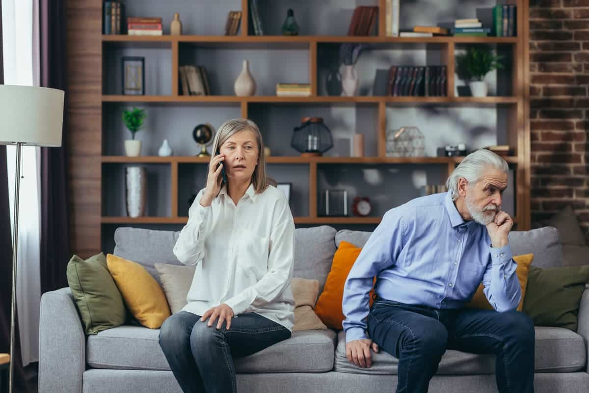 couple not getting along, fighting, not talking on the couch
