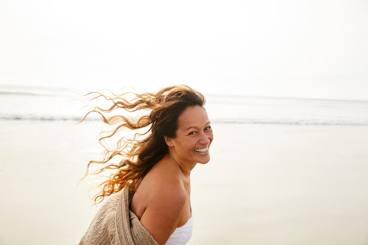 happy woman on a beach