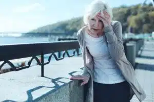 Dizzy woman with vertigo