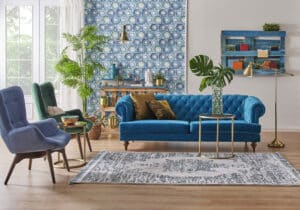 Hipstoric Home, blue couch, statement wall, retro decoration