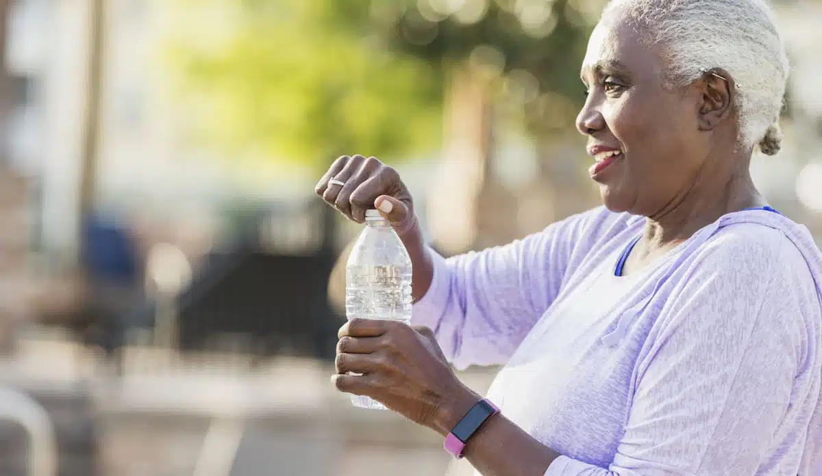 Woman drinking a bottle of water