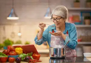 woman is preparing vegetables