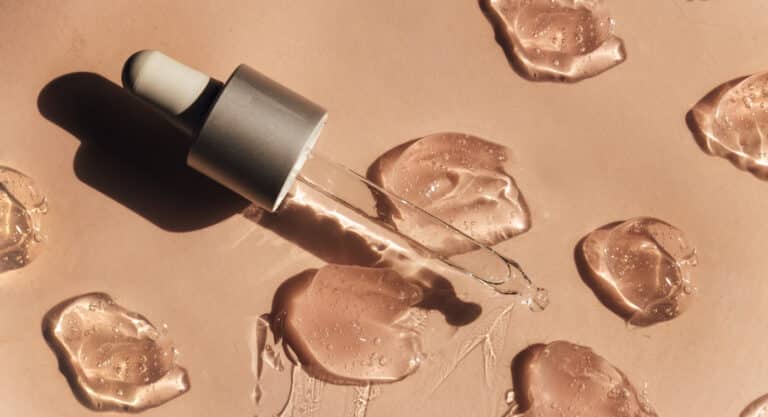 Beauty serum gel texture. Clear skincare cream with bubbles background