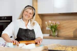 woman rolling out dough