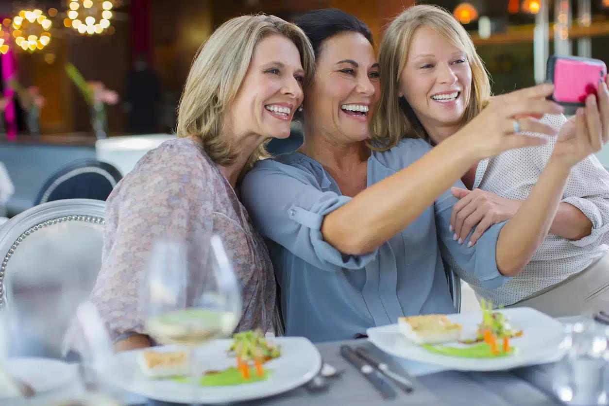 Women taking a selfie for Instagram