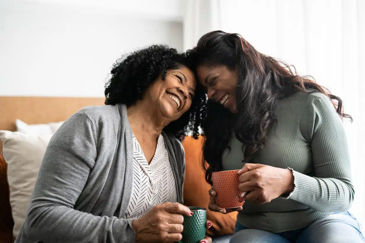 Bonding moment between mother and daughter at home