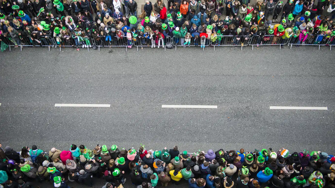 Crowds awaiting the beginning of the St. Patrick's Day Parade, Dublin city centre, Ireland.