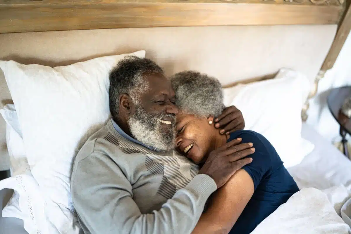 Happy couple in bed