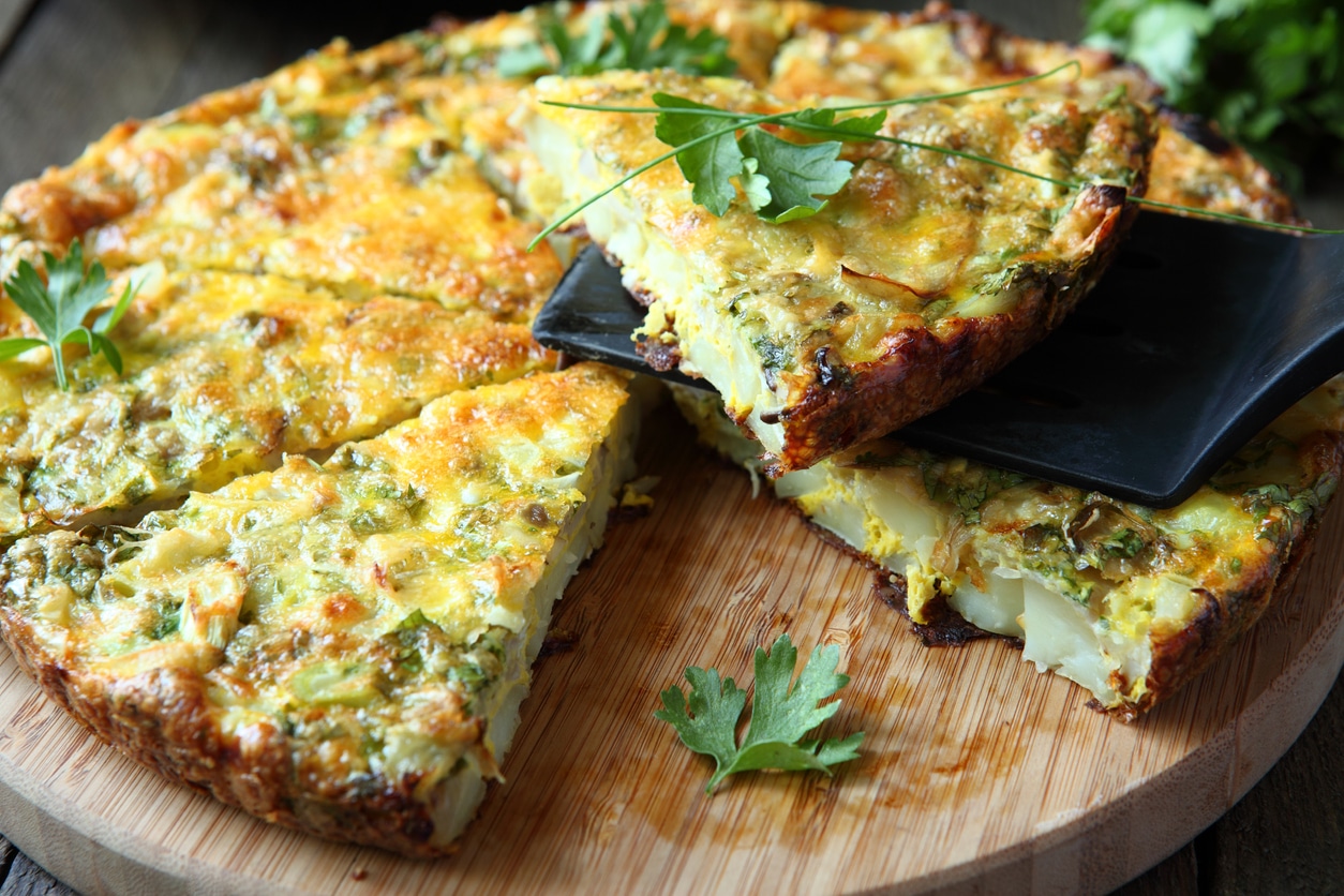 Italian Frittata with slices of fresh greens, food