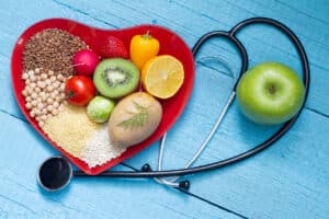 Lower you cholesterol with the TLC diet; health food; stethoscope.
