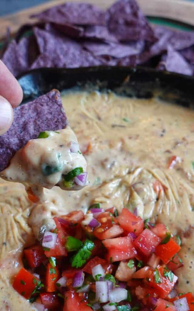 Smoked Brisket Queso over the fire cooking