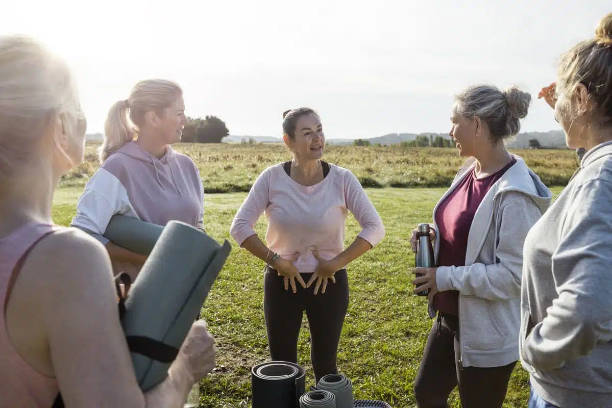 Woman discussing pelvic floor therapy with other women