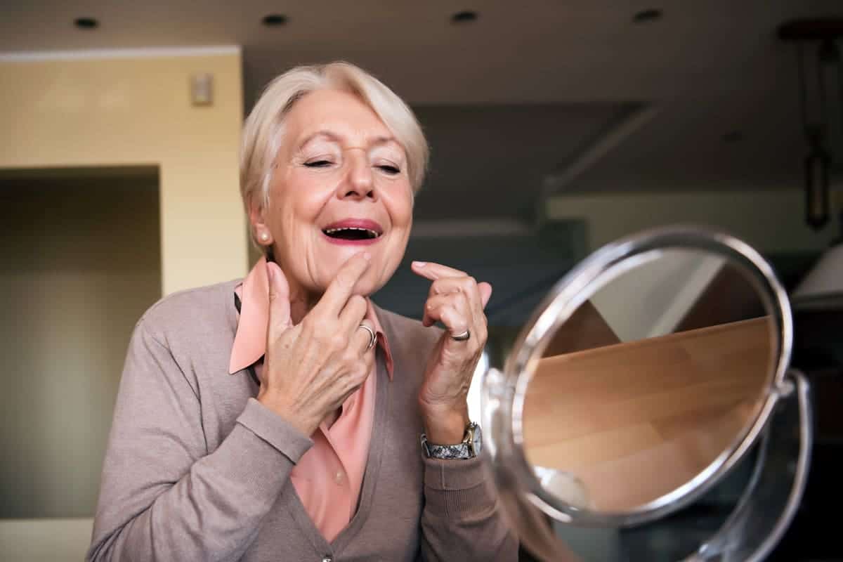 adult acne popping a pimple