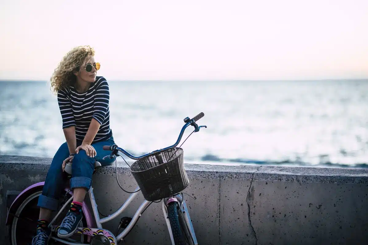 Transformational travel - woman with a bike