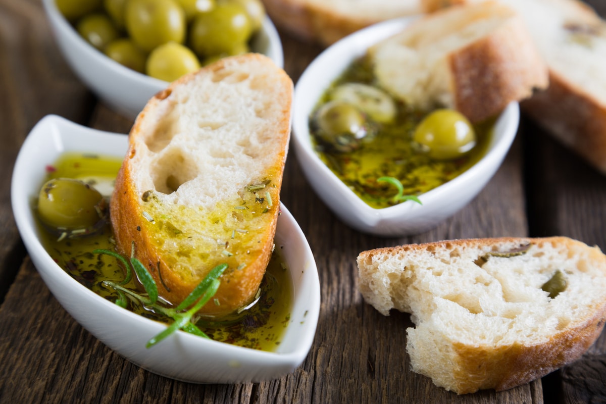 Olive oil and baguette