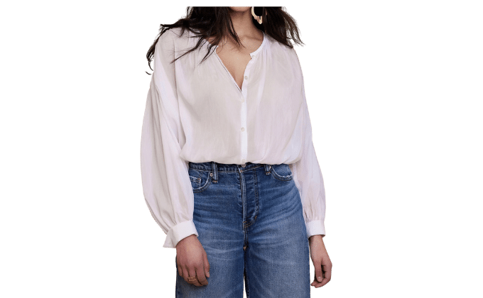 Woman wearing billowy sleeved pirate shirt