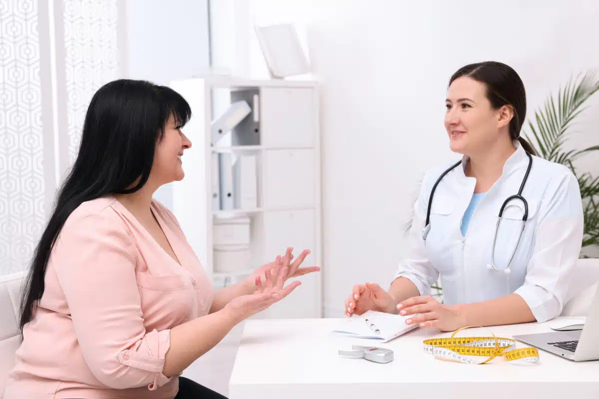 Woman talking to a doctor or nutritionist