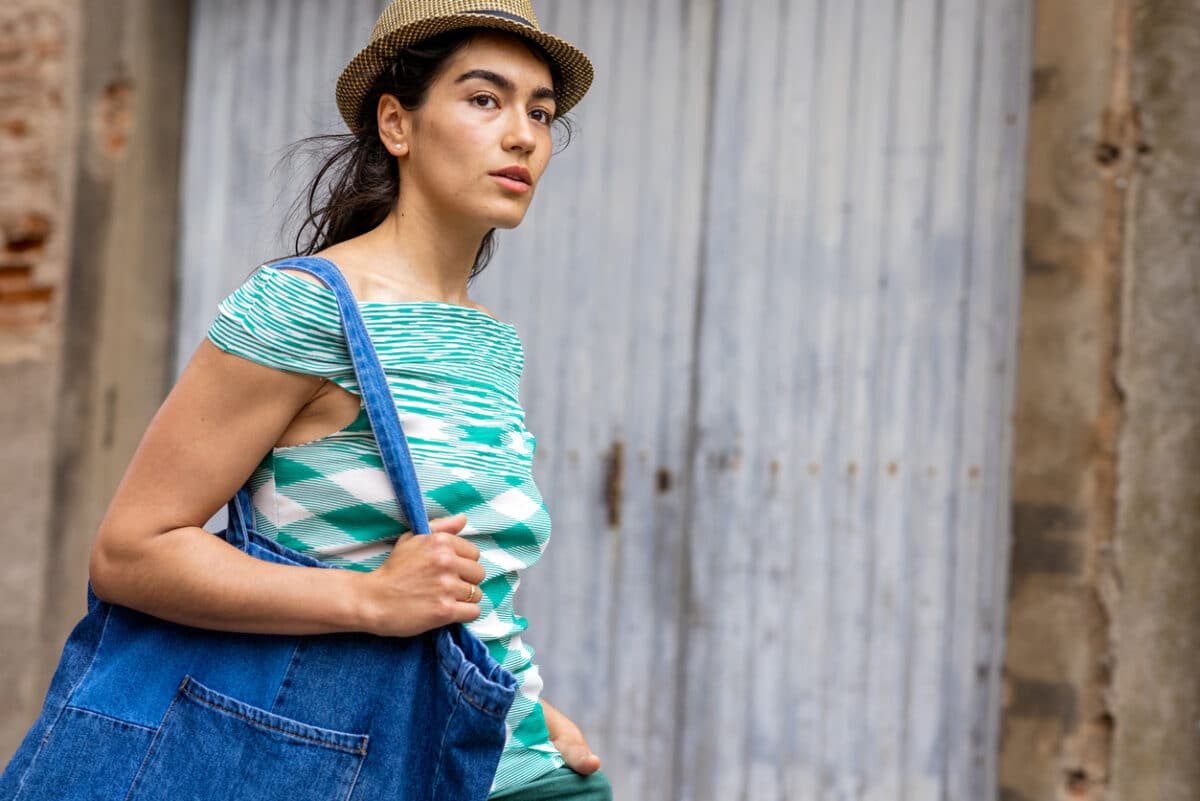 Woman shopping in a fedora