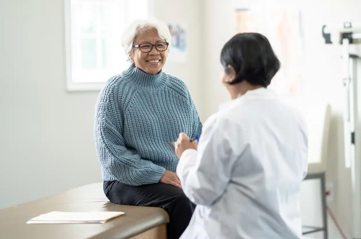 woman talking to her doctor, ALS diagnosis