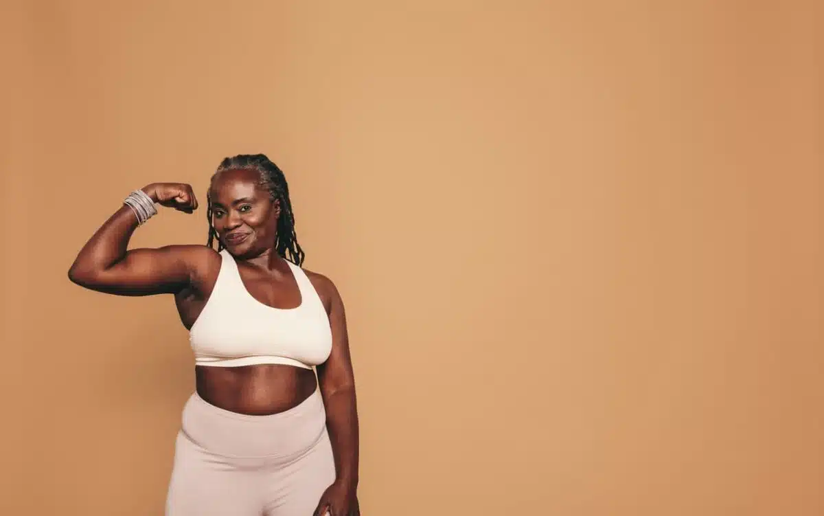 woman flexing her bicep