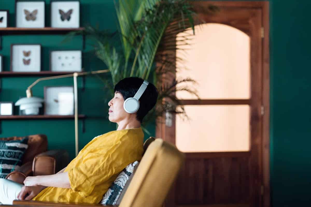 woman relaxing and listening to music