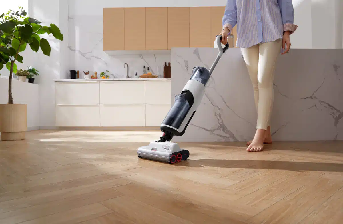 Roborock Dyad Pro woman using vac