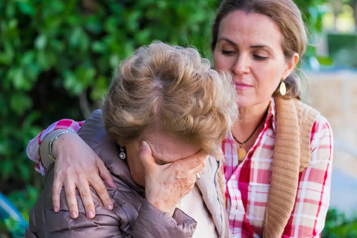 sad older woman who is crying