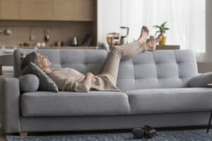 Loungewear, woman relaxing on the couch, comfortable clothing