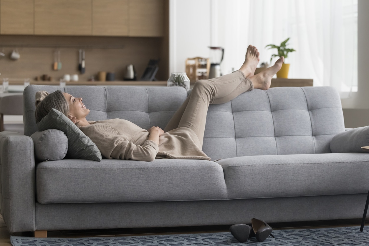 Loungewear, woman relaxing on the couch, comfortable clothing