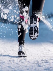 Winter running woman