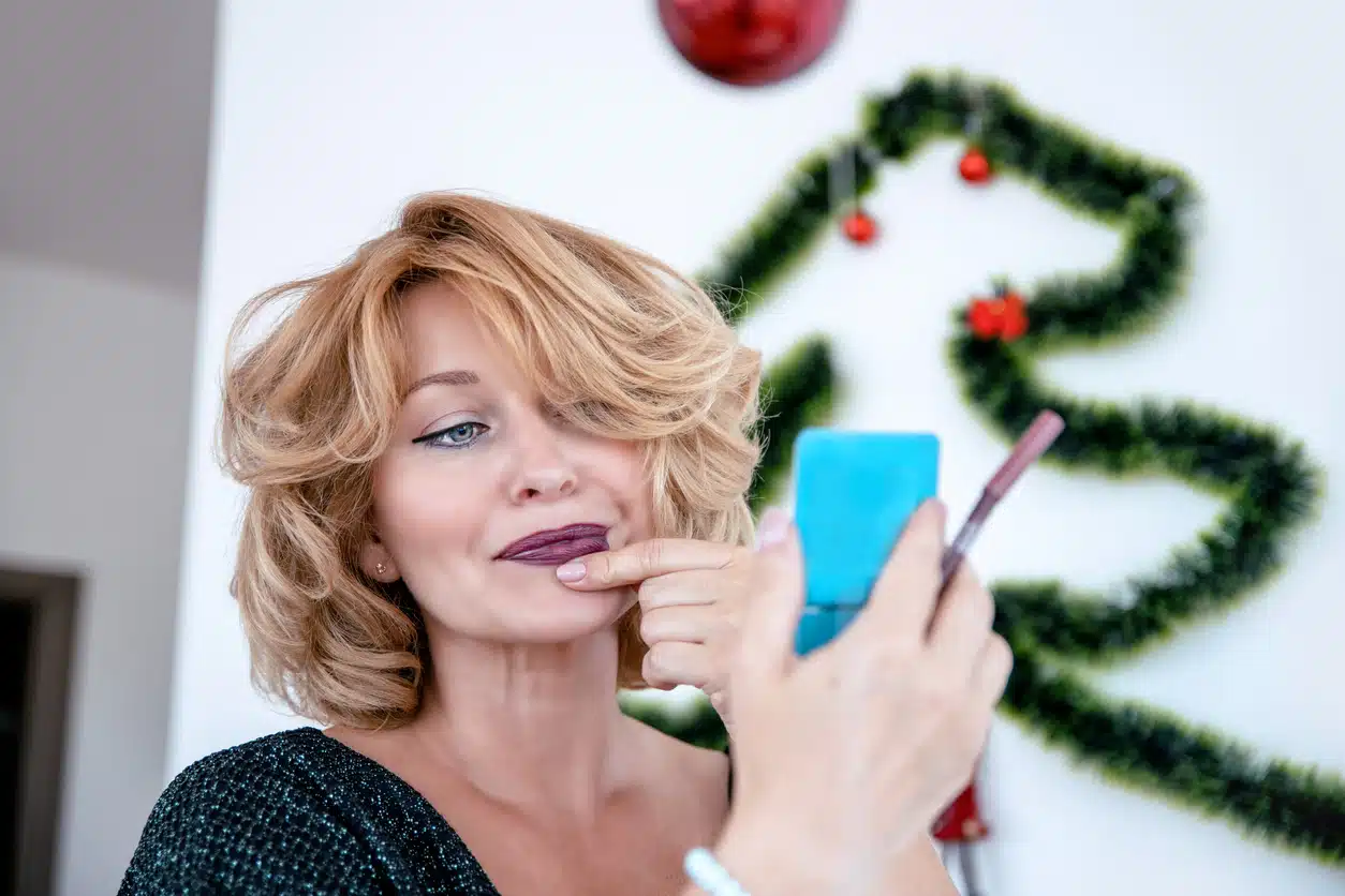 Woman checking her lipstick, fabulous woman