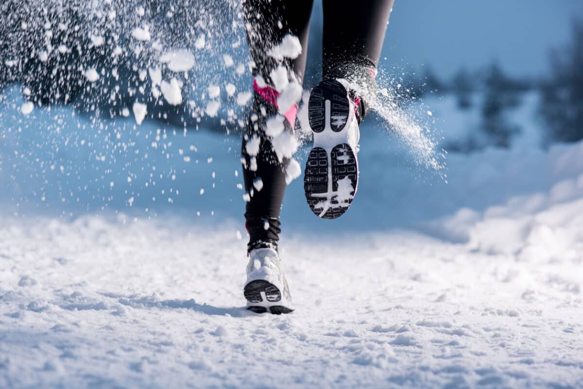 Winter running woman