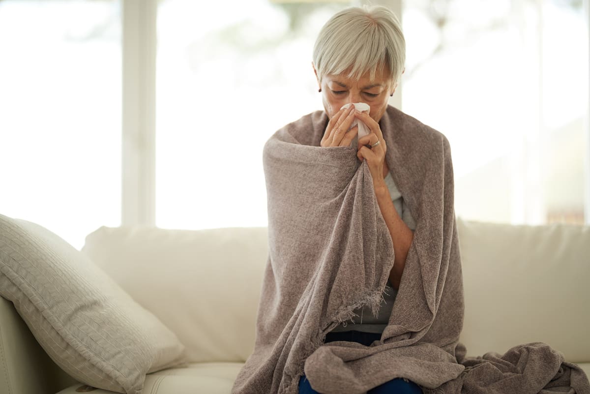 sick woman fighting the flu