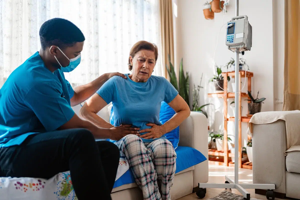 stomach pain, woman having abdomen examined