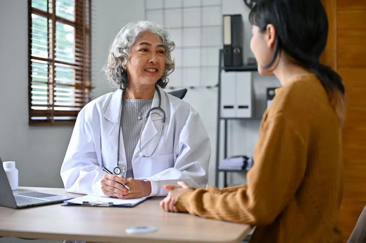 woman talking to doctor