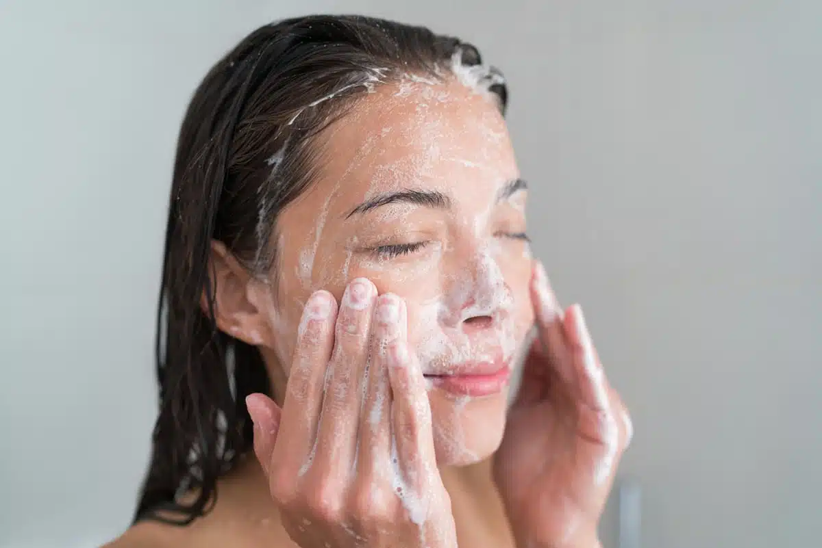 woman washing face