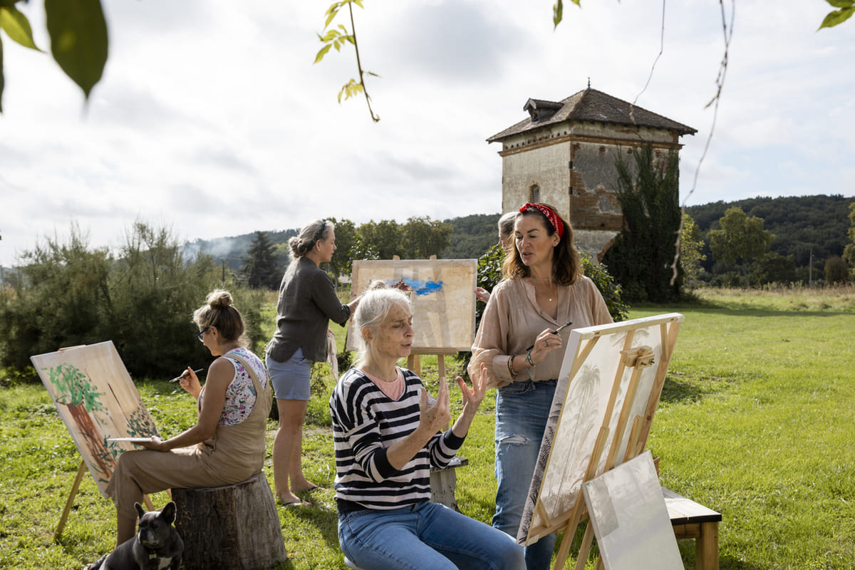 woman taking an art class