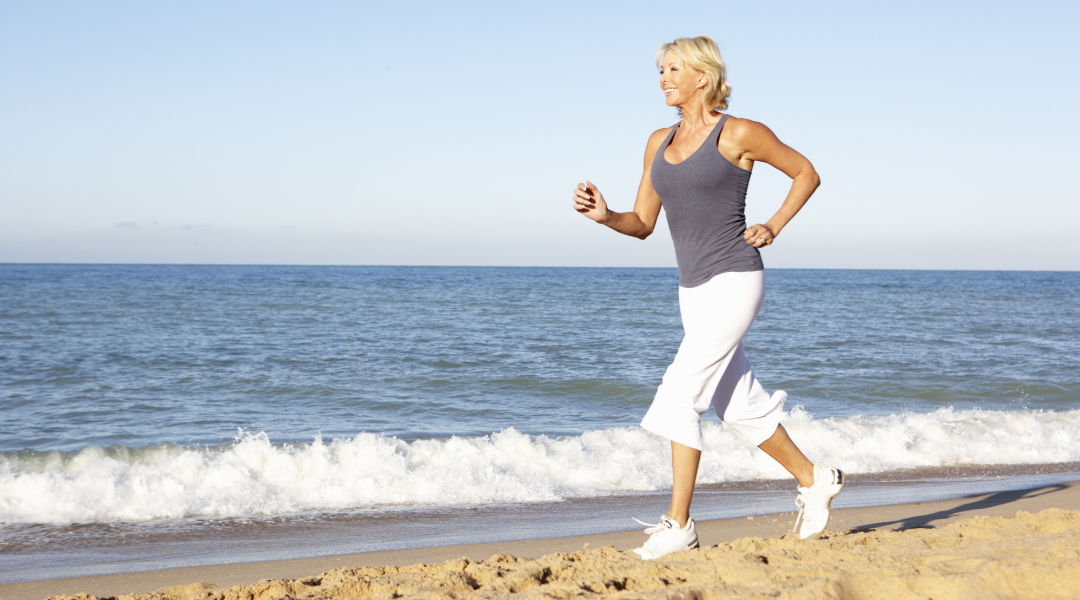 Bolster Beauty Wellness Wakeup Feature Image woman running on beach