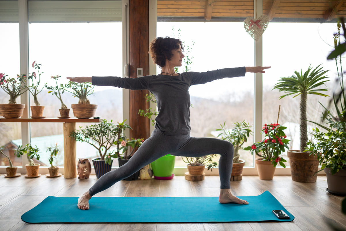 woman doing yoga at home