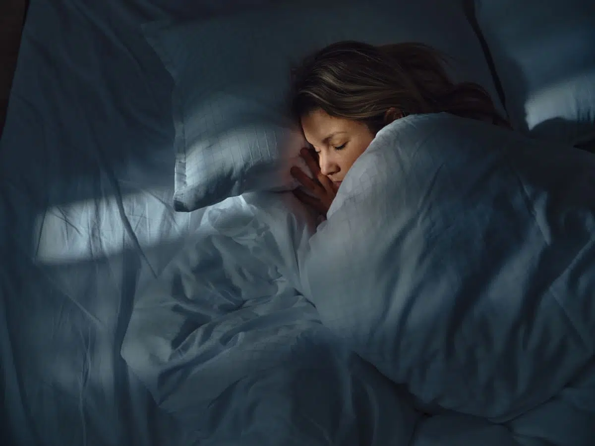 woman sleeping, improved sleep