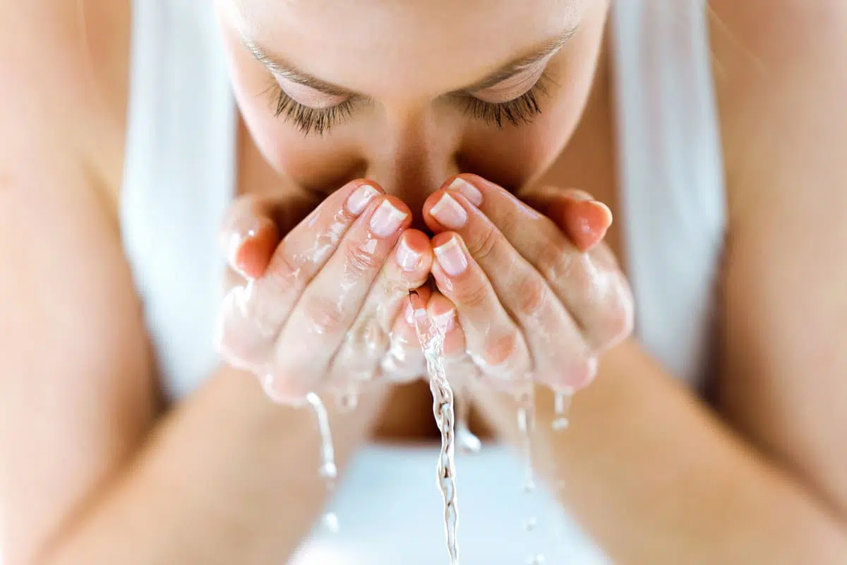 woman washing face again