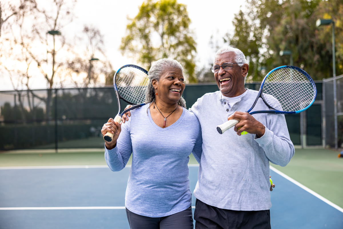 couple working out with tennis