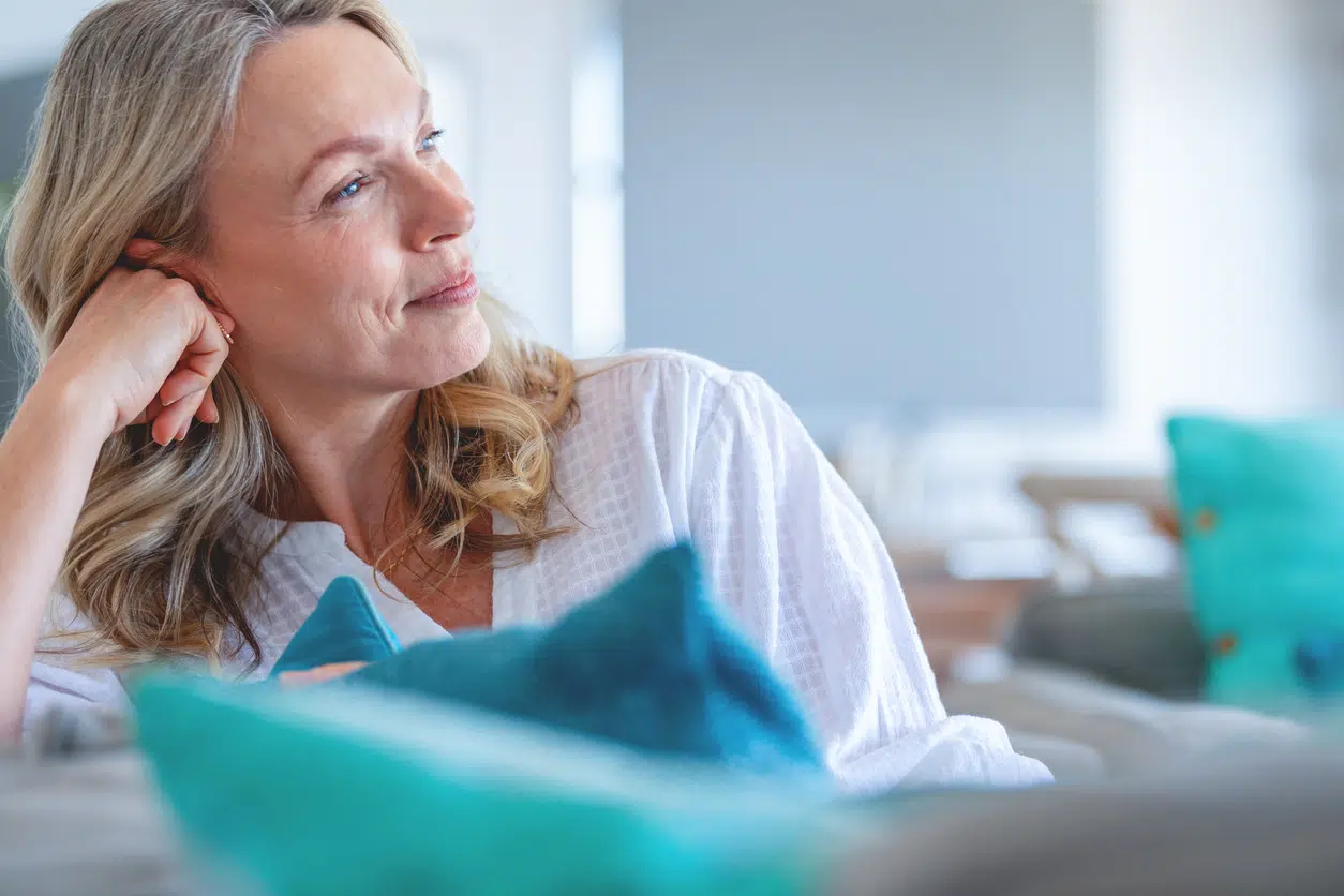 Best THC products for mature women; woman relaxing on couch; MoonWlkr